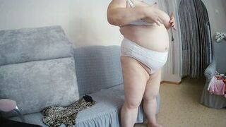 Mother-in-law with big tits caresses herself in front of the camera