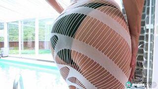 A red-hot 54-year-old's tiny bikini and gaping pussy show