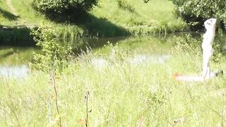 Milf sexy woman sunbathing naked on river bank. Random guy is watching. Naked in public. Public. Publicly. Wild beach Nudist. Perfect ass. Pussy. Blonde. Doggystyle. Woman got into doggy style position. Outdoor. Outside. Outdoors. Nudists. Naturist. POV - 13 image