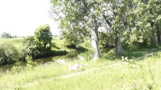 Milf sexy woman sunbathing naked on river bank. Random guy is watching. Naked in public. Public. Publicly. Wild beach Nudist. Perfect ass. Pussy. Blonde. Doggystyle. Woman got into doggy style position. Outdoor. Outside. Outdoors. Nudists. Naturist. POV
