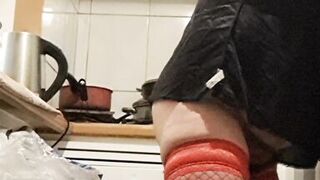 Wife in kitchen teasing husband to have sex while he watches