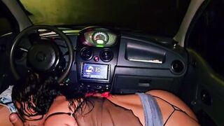 Ubersex in the city of Medellin, Colombia. Hot wife giving a blowjob in car, she sucks cab driver's cock, her cuckold husband records his slutty wife with unknown man
