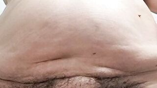 Wife cleaning her hairy pussy