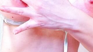 Sucking tits and covering them with cum (vertical)