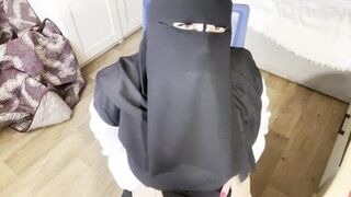 A Turkish woman with beautiful eyes in a hijab masturbates in pantyhose