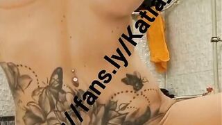 Katia Star blonde tattooed skinny fit fake tits bimbo come watch me oil up my big tits ride a dildo and cum all over it