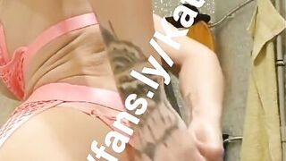 Katia Star skinny fit blonde fake tits bimbo in sexy pink outfit plays with her pussy and cums all over this dildo