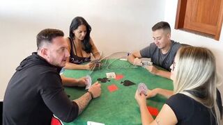 The card game ended up becoming a couple exchange. - 1 image