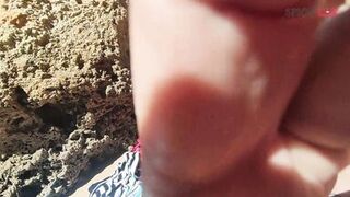 Blowjob with cumshot on a crowded beach... - 2 image