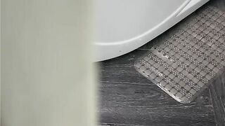 HORNY MILF WITH A HUGE ASS GETS FOOLISHLY STARED BY HER PERVERT STEPSON WHILE MASTURBATING IN THE SHOWER - 2 image