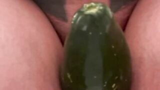 Cucumber dildo in Shower