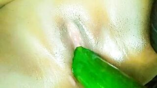 Big oiled tight pussy pleasure and enjoyment with cucumber