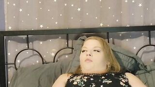 Sexy fat girl plays with shaved wet pussy in see through tights and dress