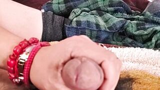 She masturbates me and my penis gets wet with droplets of pleasure.