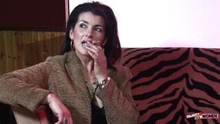 An elegant brunette MILF uses her holes to satisfy two very horny gentlemen