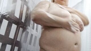Naked stepmom with big tits and ass takes a shower