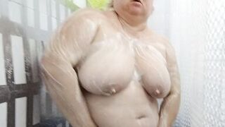 Naked stepmom with big tits and ass takes a shower