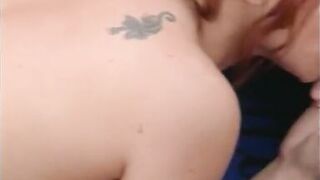 Gorgeous red head lays on the beach and gets her pussy licked