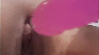 Whore stepmom masturbates her clit with her fingers and puts a dildo in her pussy