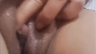 Whore stepmom masturbates her clit with her fingers and puts a dildo in her pussy