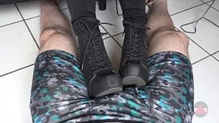 Resting her Boots on my cock and balls
