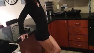 Slut in high heels, smoking, pissing in her panties.