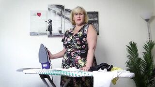 Horny stepmom in stockings ironing her panties, takes a break and fingers her wet pussy - 2 image