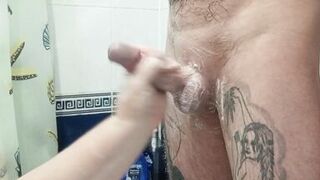 bitch jerks off my dick in the bathroom until I cum