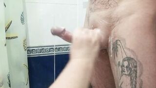 bitch jerks off my dick in the bathroom until I cum