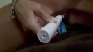 Jane loving her tooth brush - 15 image