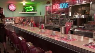 Hot blonde and brunette take turns sucking guy's tool in a bar