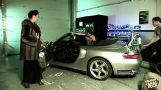 Rich british milf rewards the mechanics fixing her car by giving them both sloppy blowjobs - 1 image