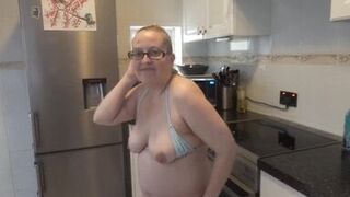 Blonde MILF Striptease in miniskirt and bikini - 15 image