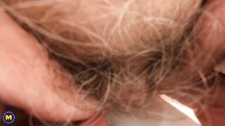 Nerd GILF with big natural tits and hairy pussy reaching